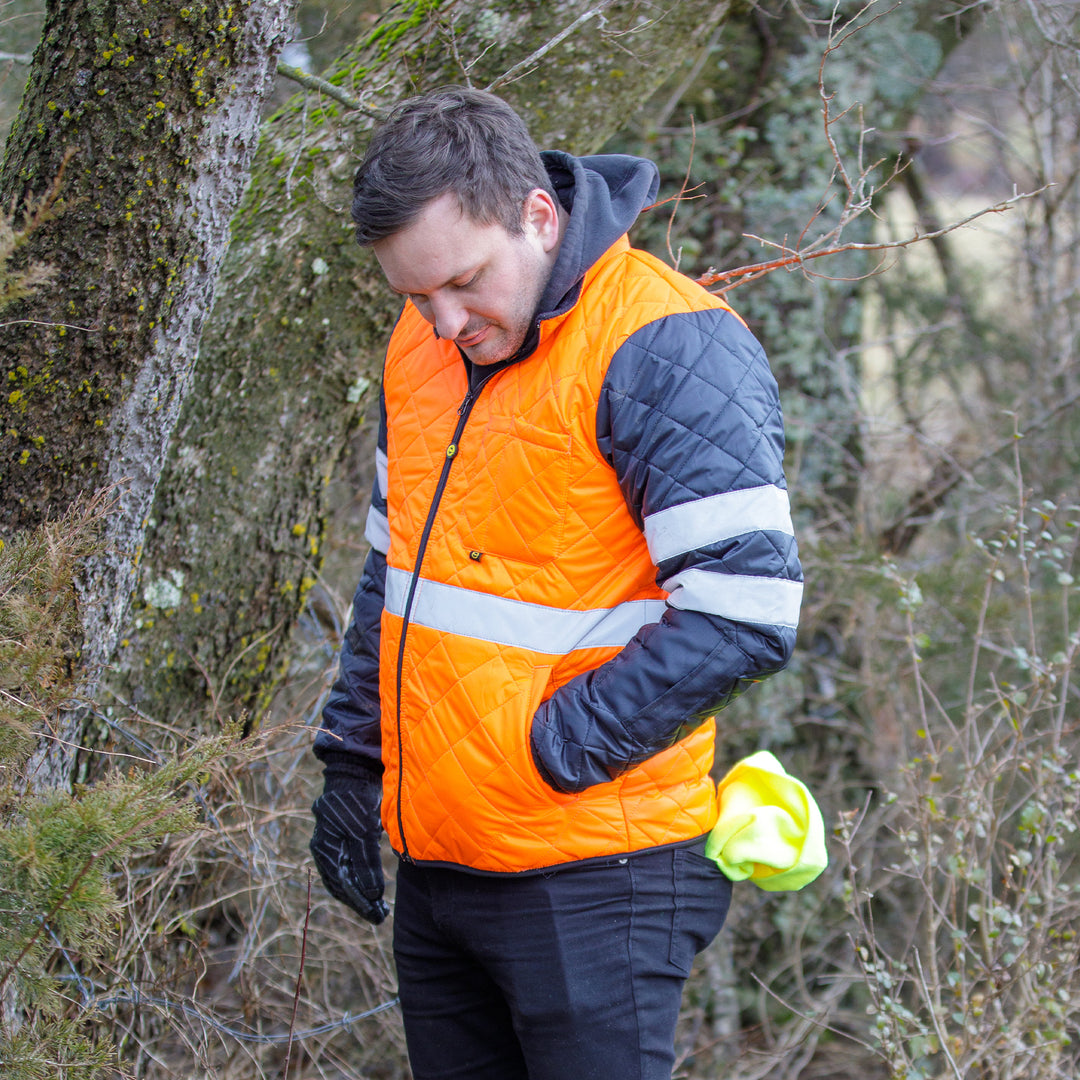 Epik Agile ANSI class 2 Hi Vis Jacket in forest posing