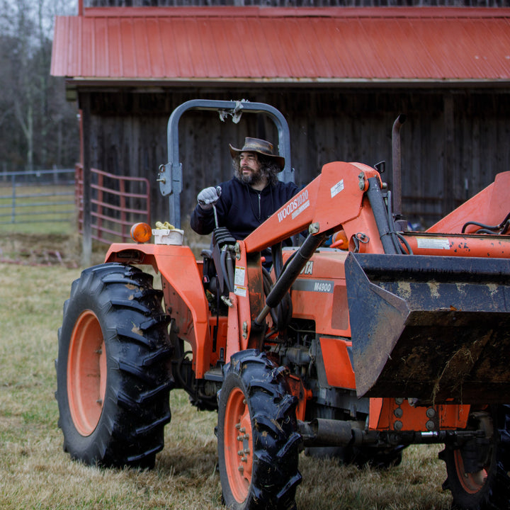 Epik Peak Pro Heavily insulated Work Hoodie in Black on the farm